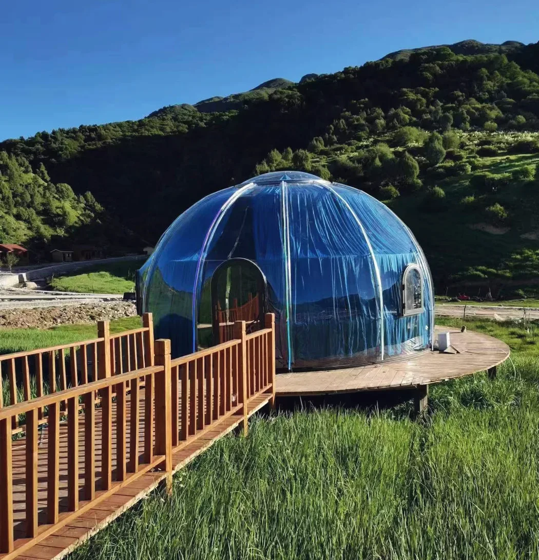 Round 6.0 m clear polycarbonate dome: on a timber platform on a hillside, reached by a boardwalk